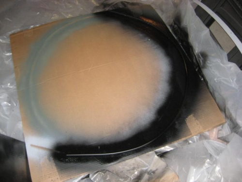 Hard to see, but there is a windscreen bow in that black mass.