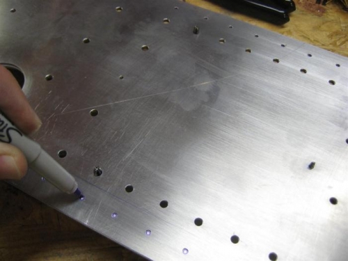 W10-01 laid over W10-05. Using -01, I located the holes on -05.