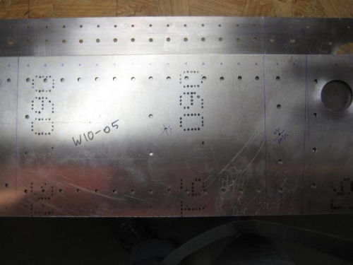 W10-05 shown below W10-01. See the holes at the top of -01 that were located on -05
