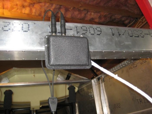 Headset-jack mounting box, with wires coming out to the right.