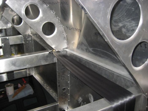 Rear seat belt attachment