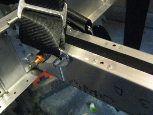 Attached center seat belts with -27 bolt