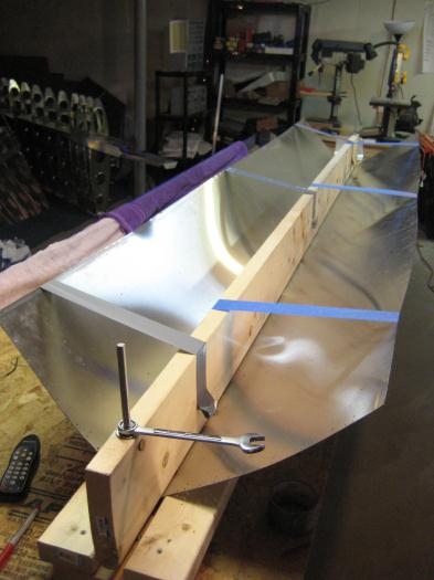 Using tape to keep the skins from counter-bending outward.