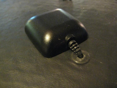 GPS stuck down with double sided tape. Rubber grommet in hole.