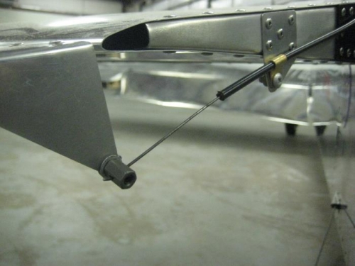 New trim tab cable attachment.