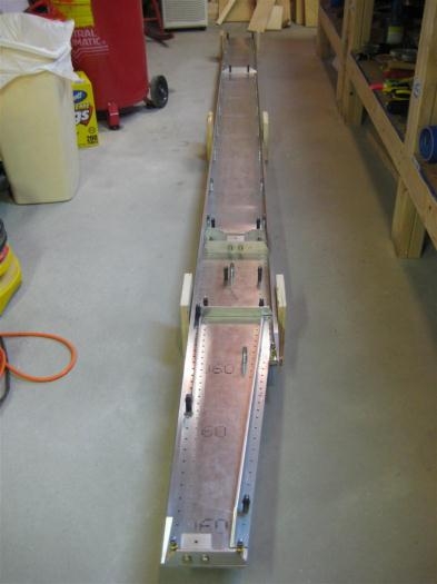 Spar from the other end, cradled in my spar spacers, which double for holding the spar during riveting