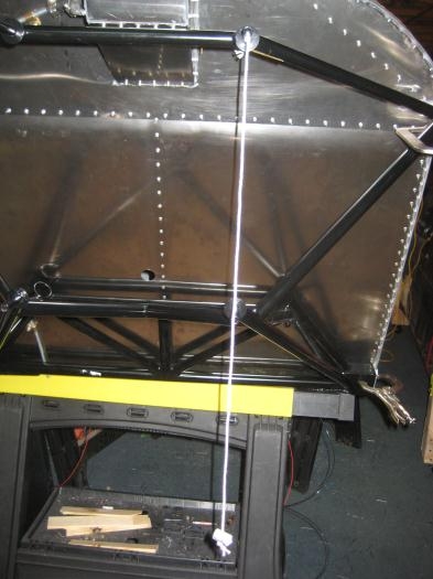 Plumb line to ensure lugs aligned left/right