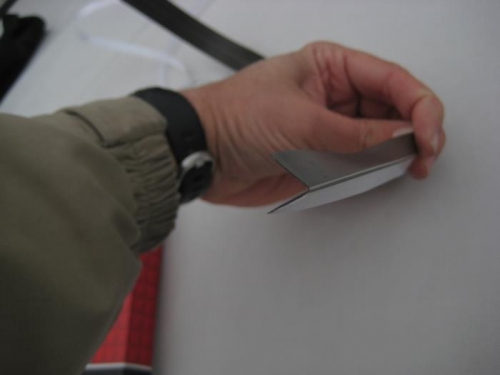 Bent to shape; white is adhesive side.