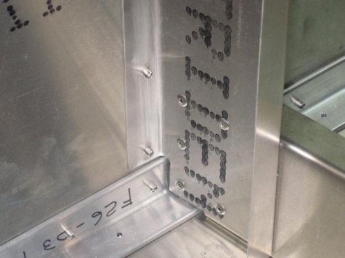 The lower cross ties riveted in place.