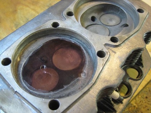 Colored water fills the head through the small hole.