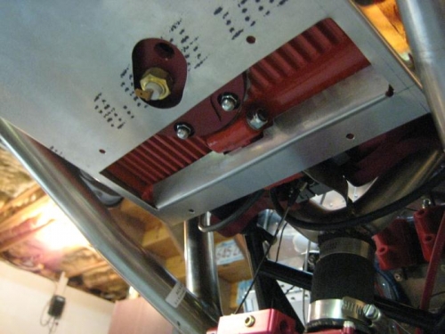 Oil cooler baffle with dam at the back side.