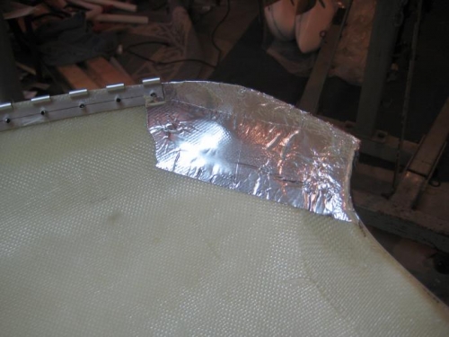 Aluminum tape so fiberglass won't stick to this cowl half.