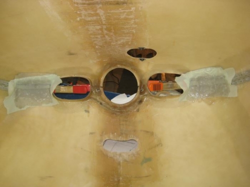 Glass on the lower cowl, overlapping the alum tape on the upper cowl.