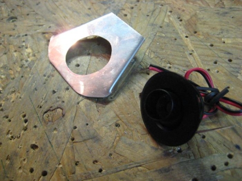 Testing a bracket for a cockpit light.