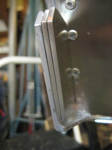 Shims held with double-sided carpet tape.