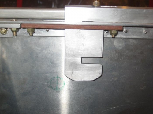 Measured location for hole. Latch will clear it when it is in the unlocked position.