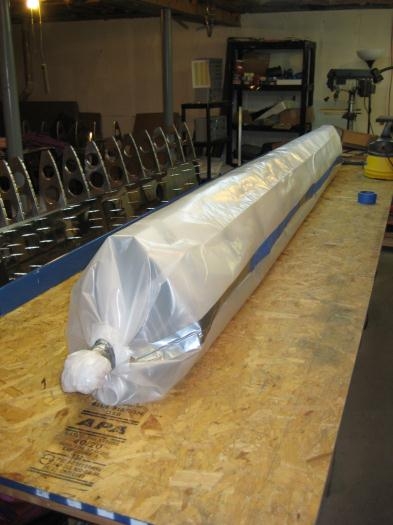 Plastic wrapped over and around skin, and then taped closed.