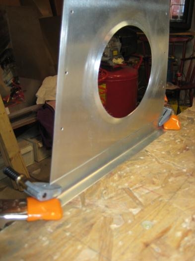 With the angle on the bench, the edges of the parts are held flush.