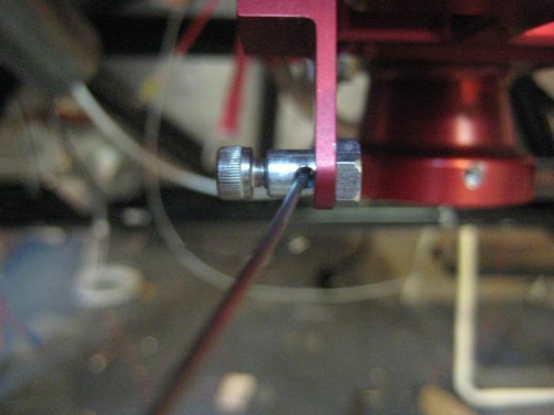 Mixture cable through swivel nut. See how close the hole is to the arm.