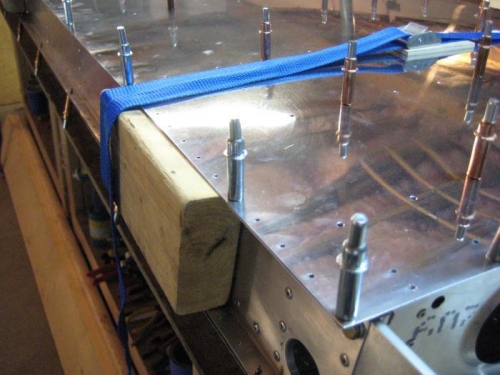 2x4 in rear spar to keep straps from crushing the flanges of the rear spar.
