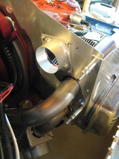 Air outlet at back of baffle, for cabin heat.