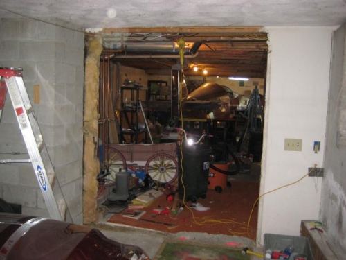 View from the garage. You can see the tail of the aircraft, beyond.