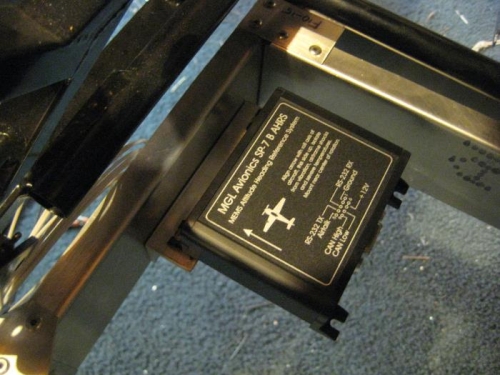 The AHARS on bracket #1, under the seat pan.