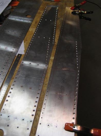 Right spar (on left) done countersinking; left spar (on right) in progress