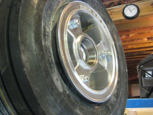 Tire prior to inflation. Note tire away from outside rim.