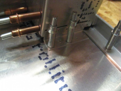 The cross tie box bracket being  drilled.