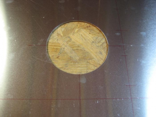Inspection hole made with a fly cutter.