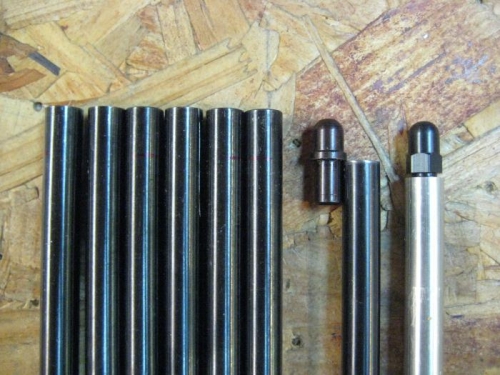 Measuring tool at far right, cut pushrod to its left and one of the tips to the right of that.