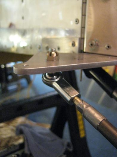 Rod end bearing at rudder horn; temporary duct tape holding bolt in tube