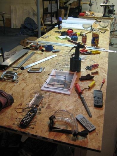 Work table is getting a bit cluttered.