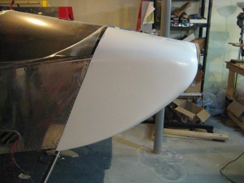 Roughly at fuselage (lots of fitting and cutting to go).