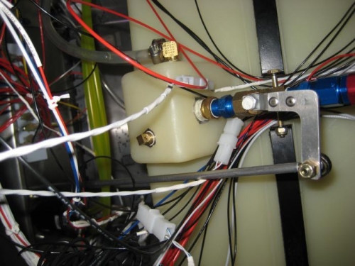 After tapping the tube, the rod in place, with valve in the OPEN position.