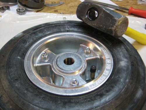 With bearing and dust cap in place, dust cap is now flush with wheel hub.