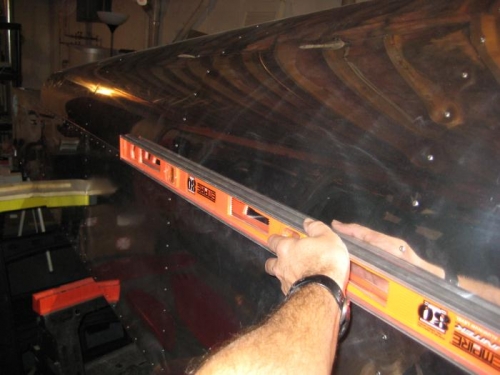 Leveling the aft fuselage along the top edge of the side skin