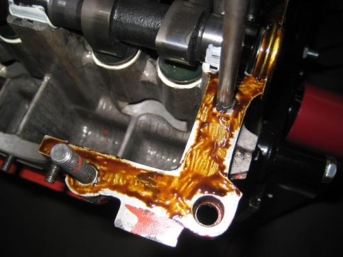 Permatex on the mating halves and the cam plug.