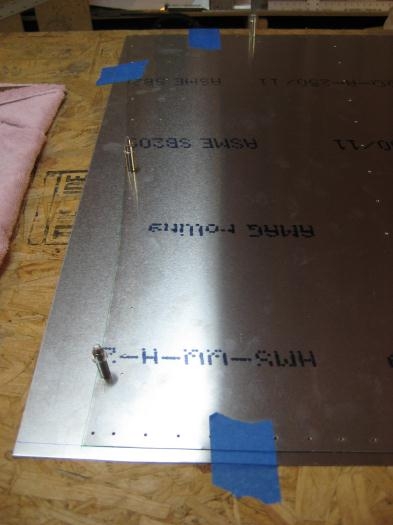 Clecos holding both sheets in alignment. You can just see the green lines tracing the 