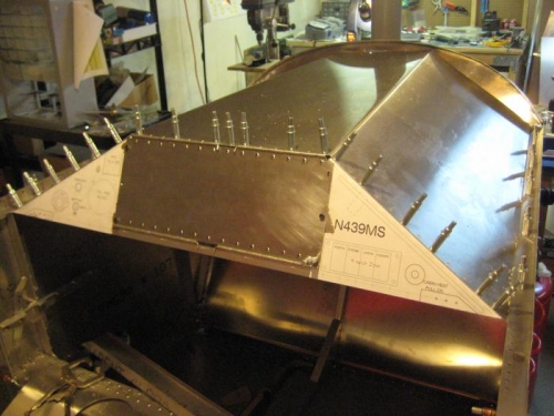 All holes in the glare shield, inst panel & panel hinges