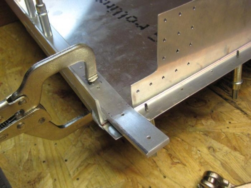 Brackets at top of fuselage