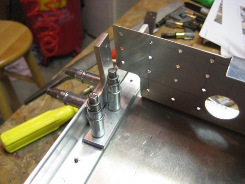 Brackets at bottom of fuselage.