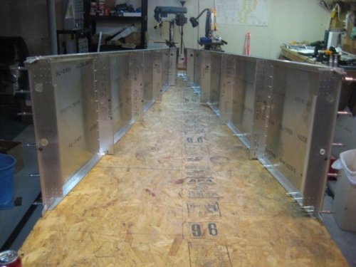 Fuselage laid out upside-down, with 40