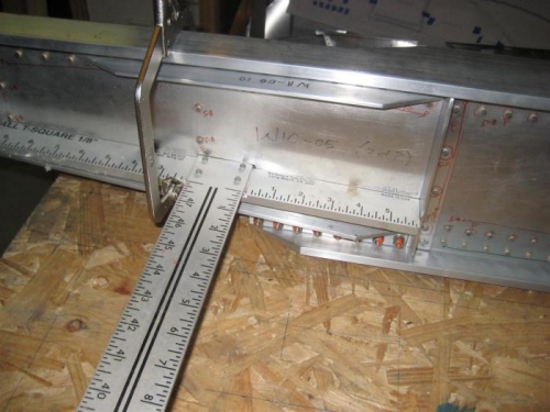 T-square against the spar web, and clamped in place.