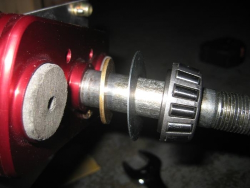 Spacer (washer), dust cover, bearing.