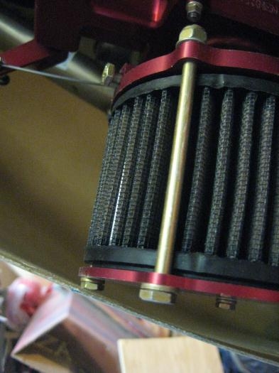 The bolt head of my air cleaner just barely touches the cowl.