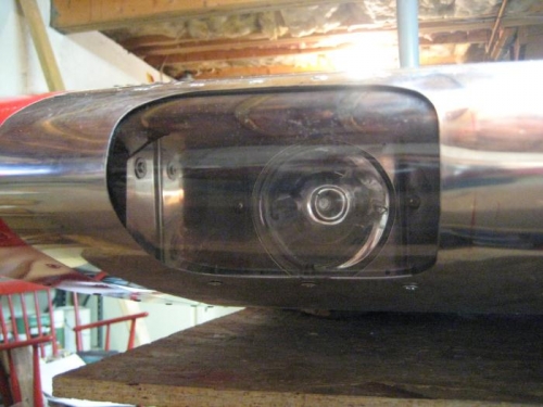 Landing light behind lens