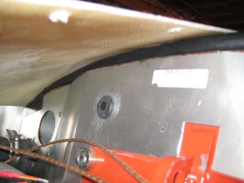 A view under the upper cowl, with the baffle seal against the underside of the cowl.