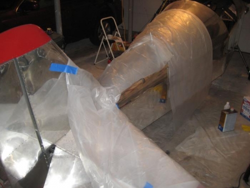 Plastic to keep the flung material off the rest of the plane.